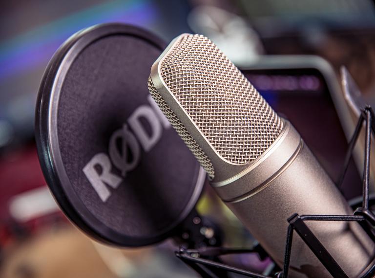 Close up shot of microphone and shield guard