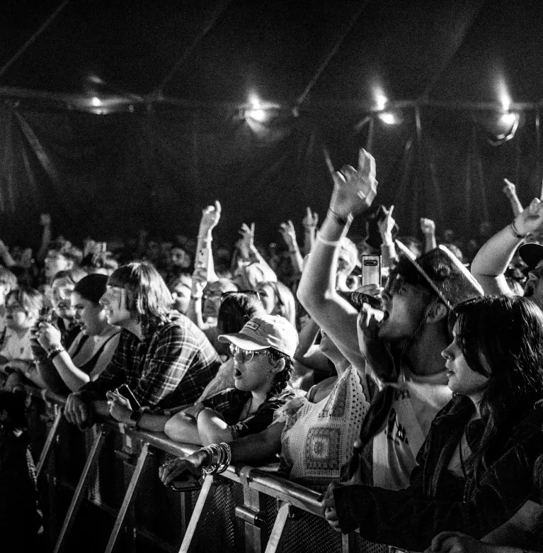black and white image of a packed crowd line at the Focus Festival