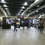 Wide shot of people browsing screens and stands at the Games Developer Conference